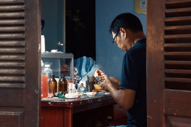 Man making teeth